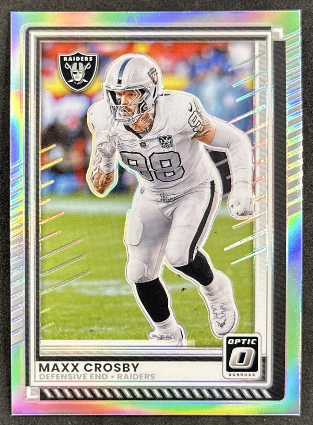 Maxx Crosby 2025 Panini Donruss Optic Holo Prizm Raiders front