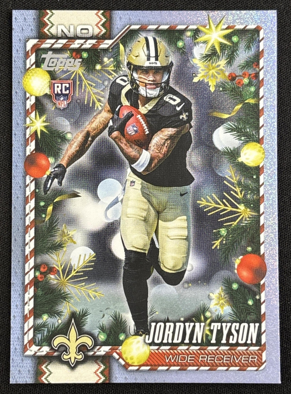 Jordyn Tyson 2026 Topps Holiday Light Blue and White Glitter Saints