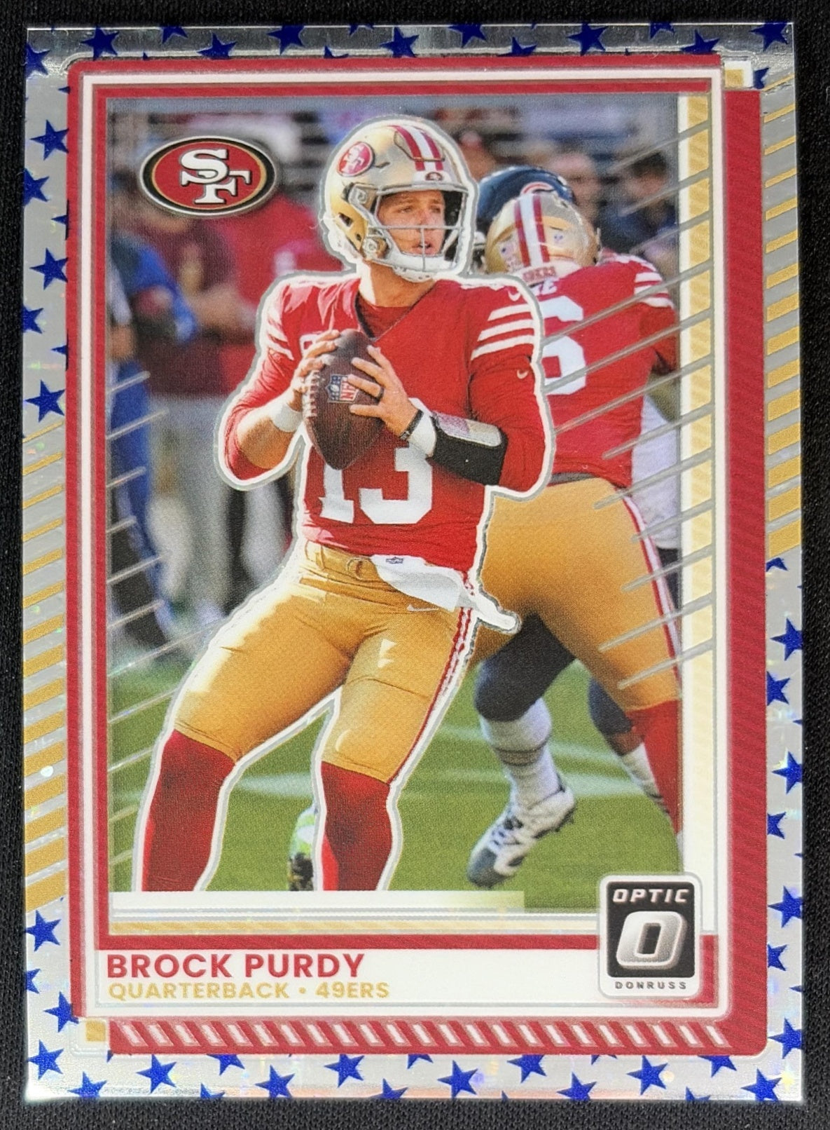 Brock Purdy 2025 Panini Donruss Optic Stars Prizm 49ers Front