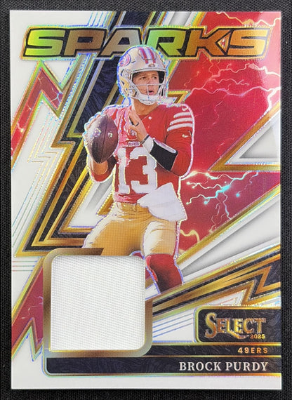 Brock Purdy 2025 Panini Select Sparks White Prizm /99 49ers