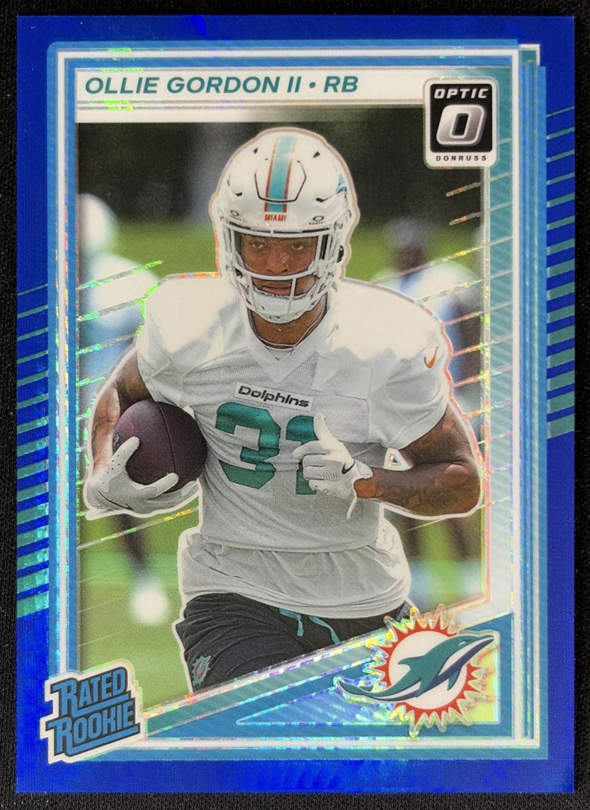 Ollie Gordon II 2025 Panini Donruss Optic Rated Rookie Blue Hyper Prizm Dolphins front