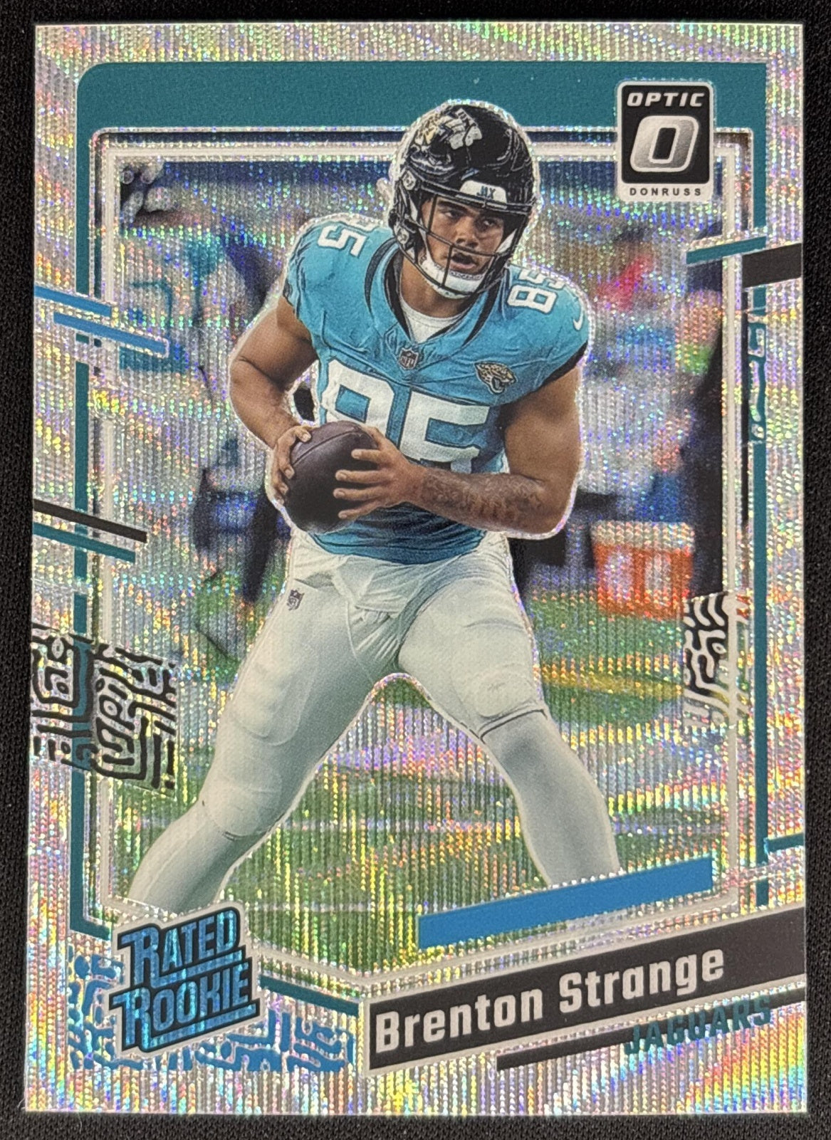 Brenton Strange 2023 Panini Donruss Optic Wave Prizm /300 Jaguars front