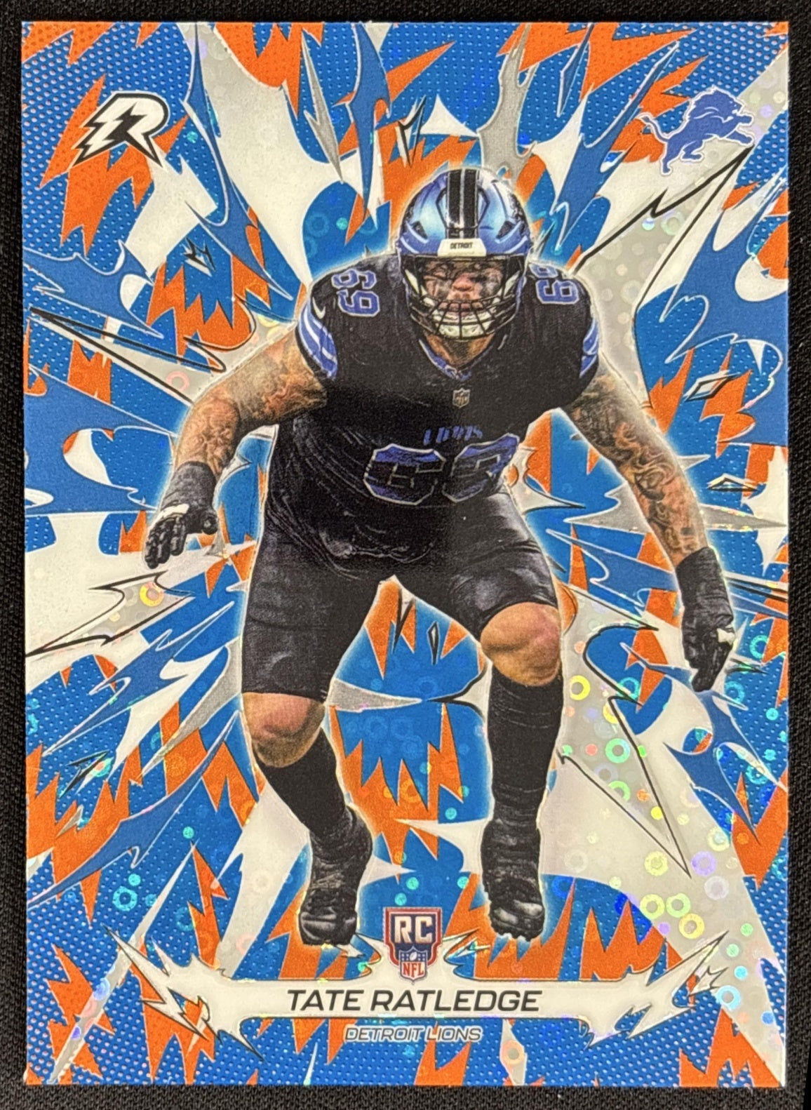 Tate Ratledge 2025 Topps Resurgence Blue and Orange Spark Refractor Lions