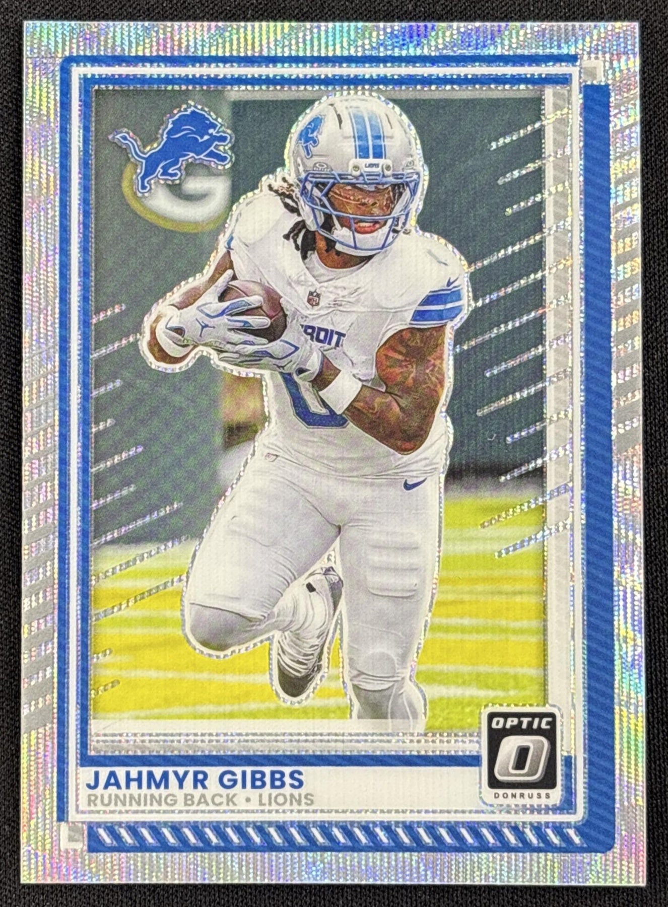 Jahmyr Gibbs 2025 Panini Donruss Optic Wave Prizm /300 Lions