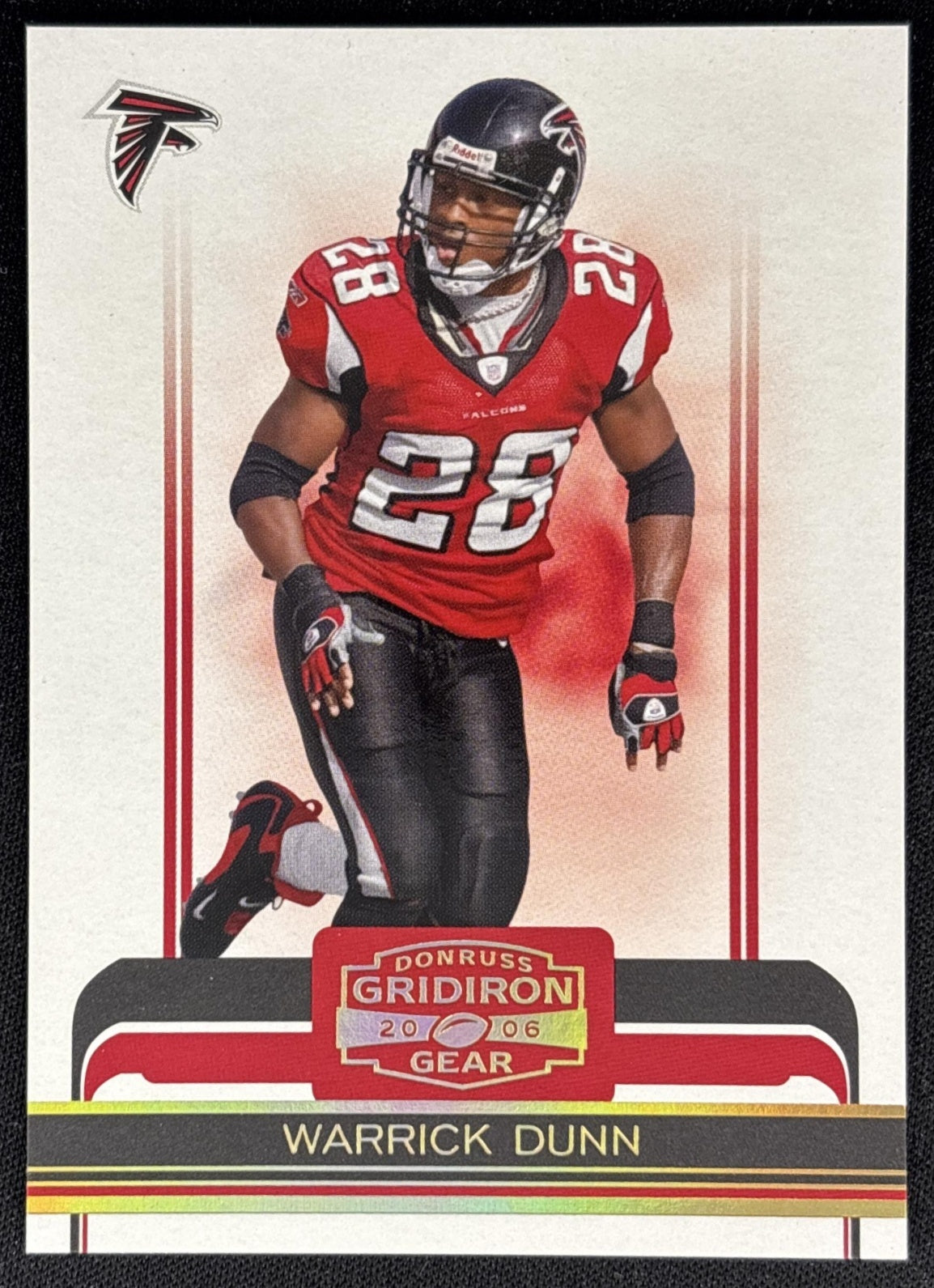 Warrick Dunn 2006 Donruss Gridiron Gear Gold Holofoil /200 Falcons front