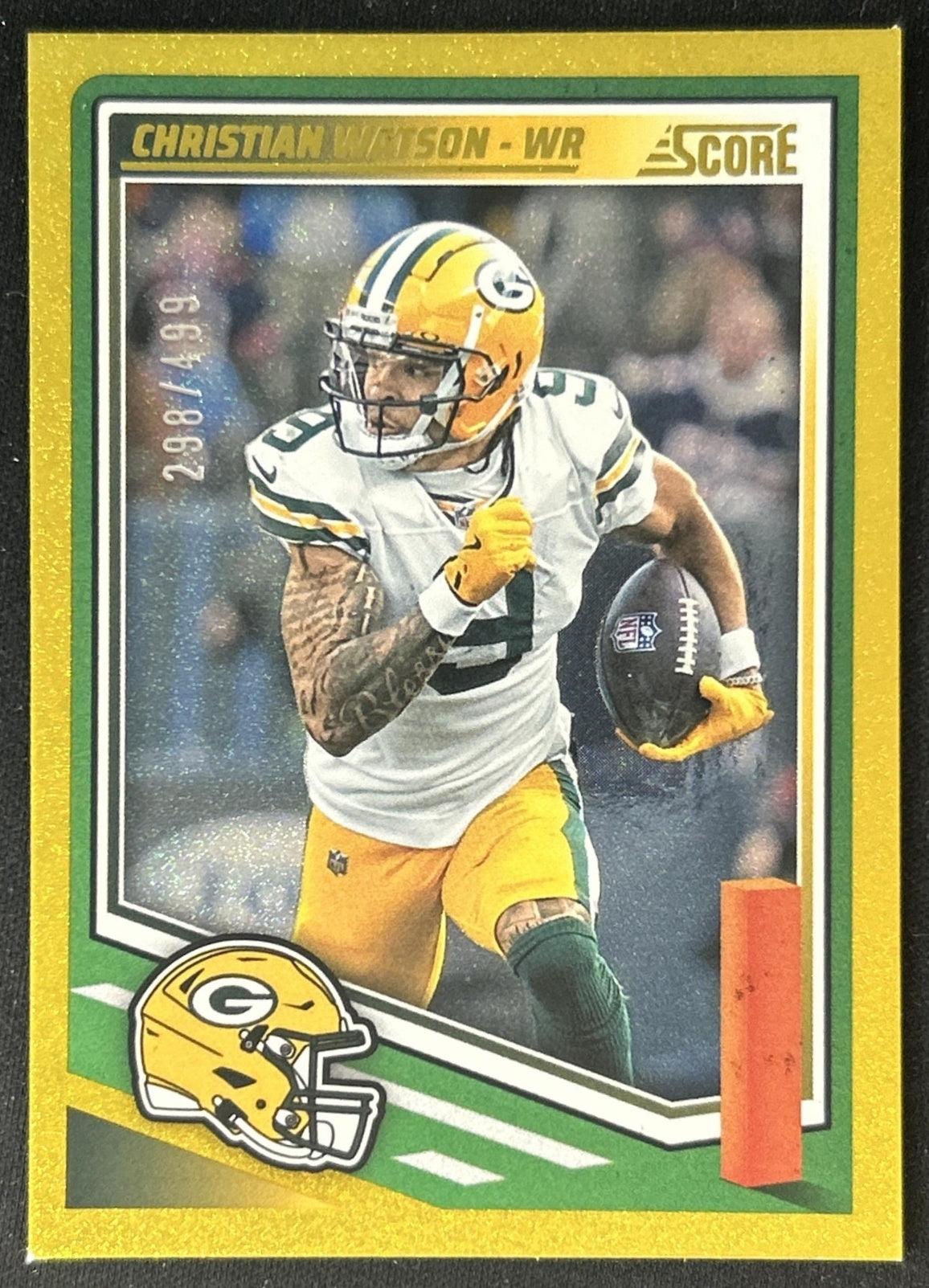 Christian Watson 2025 Panini Score Dots Gold /499 Packers front