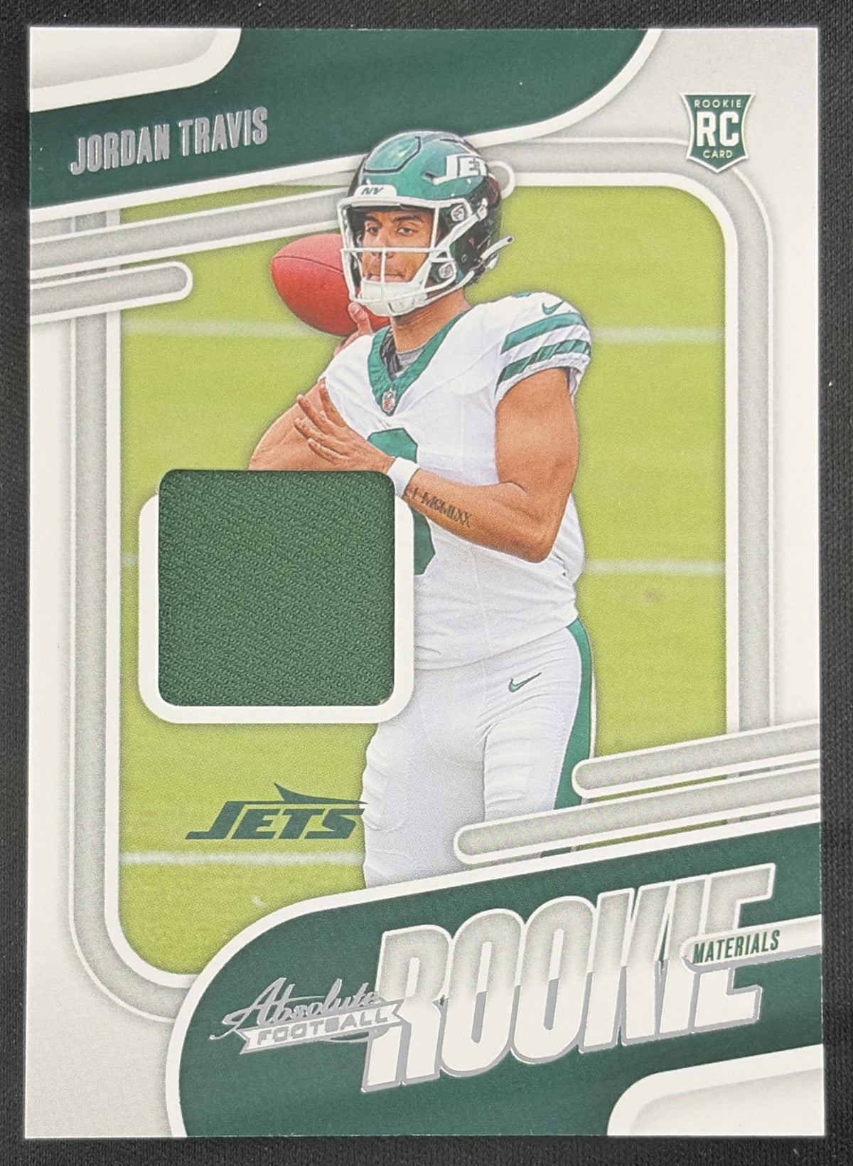 Jordan Travis 2024 Panini Absolute Rookie Materials Jets