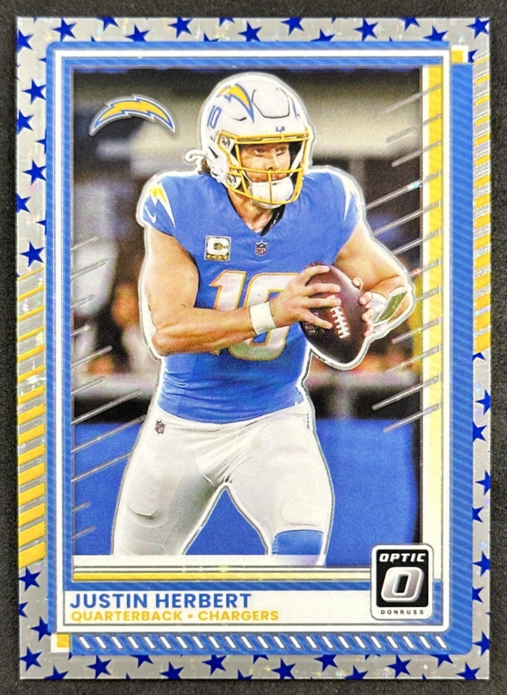 Justin Herbert 2025 Panini Donruss Optic Stars Prizm Chargers front