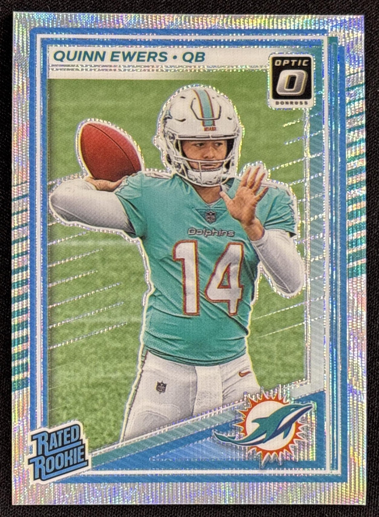 Quinn Ewers 2025 Panini Donruss Optic Rated Rookie Wave Prizm /300 Dolphins