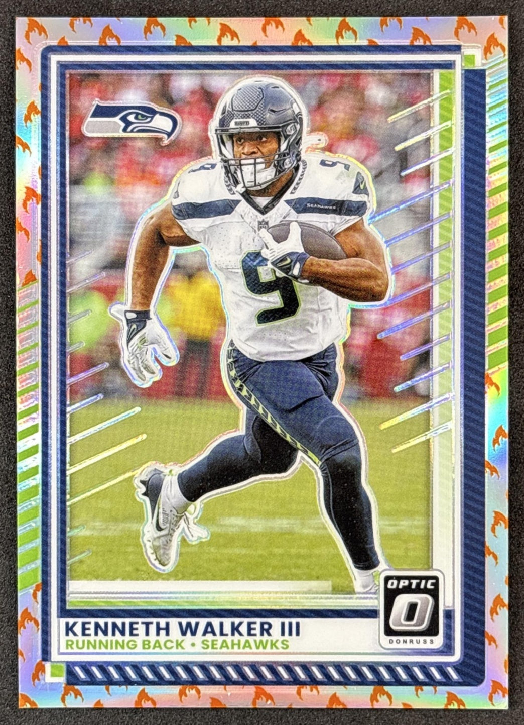 Kenneth Walker III 2025 Panini Donruss Optic Fire Prizm Seahawks