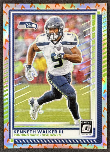 Kenneth Walker III 2025 Panini Donruss Optic Fire Prizm Seahawks