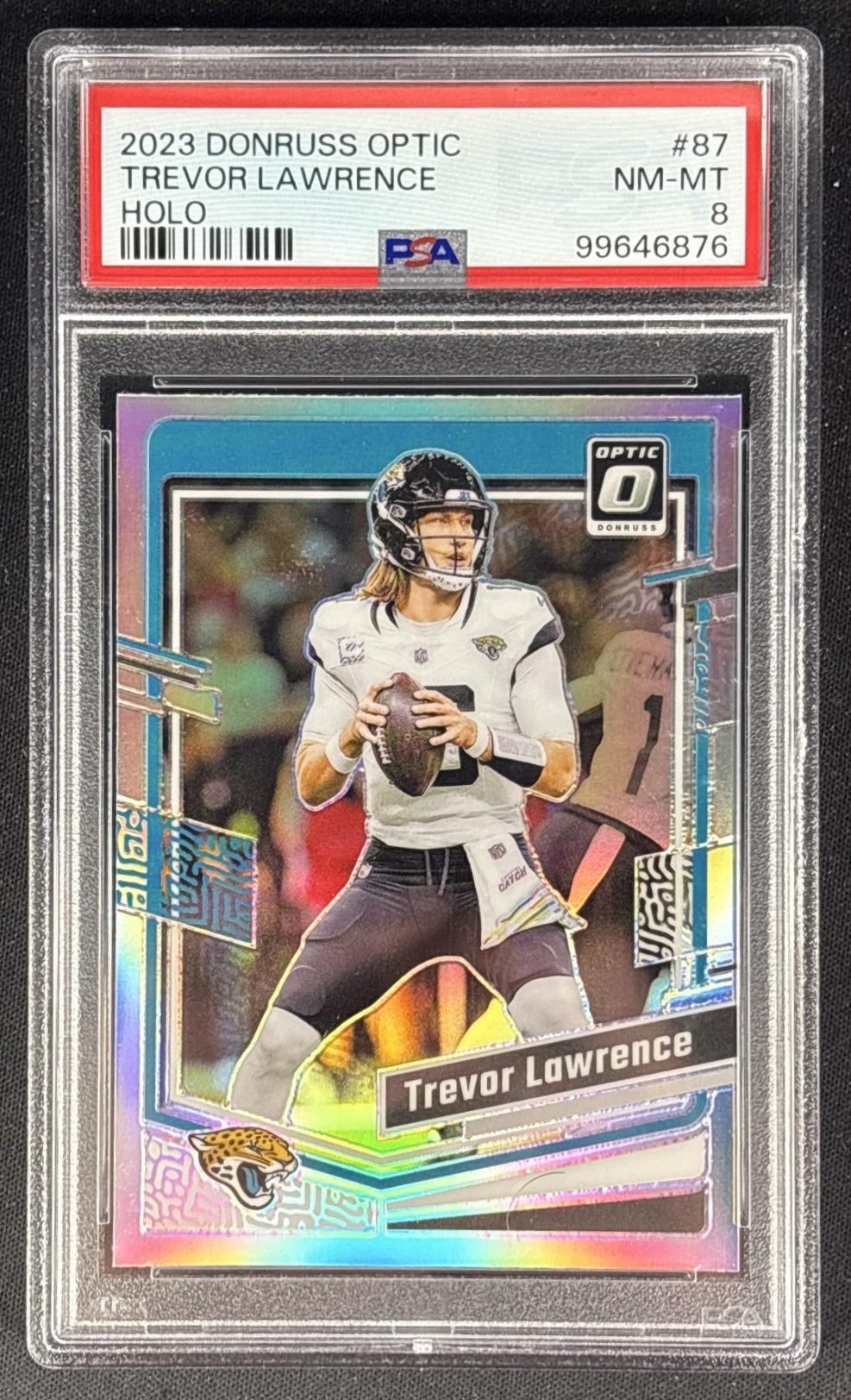 Trevor Lawrence 2023 Panini Donruss Optic Holo Prizm PSA 8 Jaguars