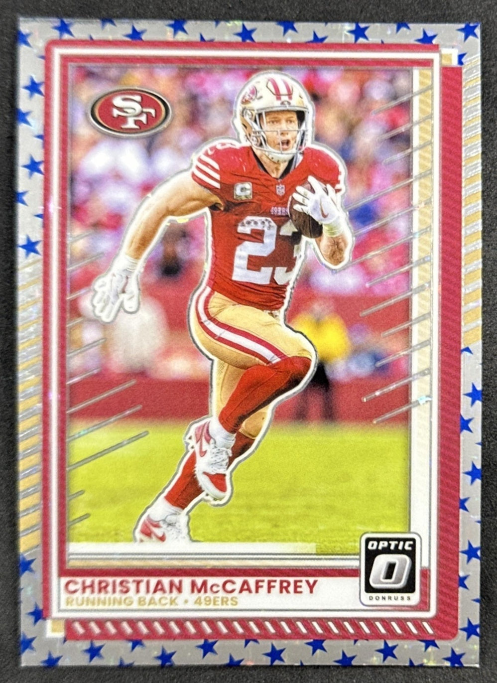 Christian McCaffrey 2025 Panini Donruss Optic Stars Prizm 49ers front