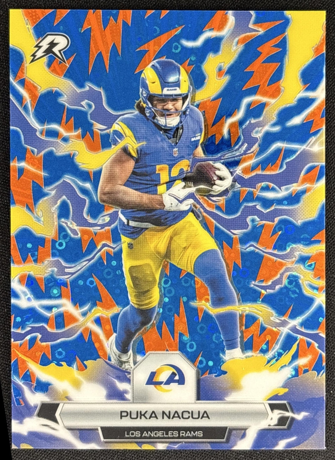 Puka Nacua 2025 Topps Resurgence Blue and Orange Spark Refractor Rams