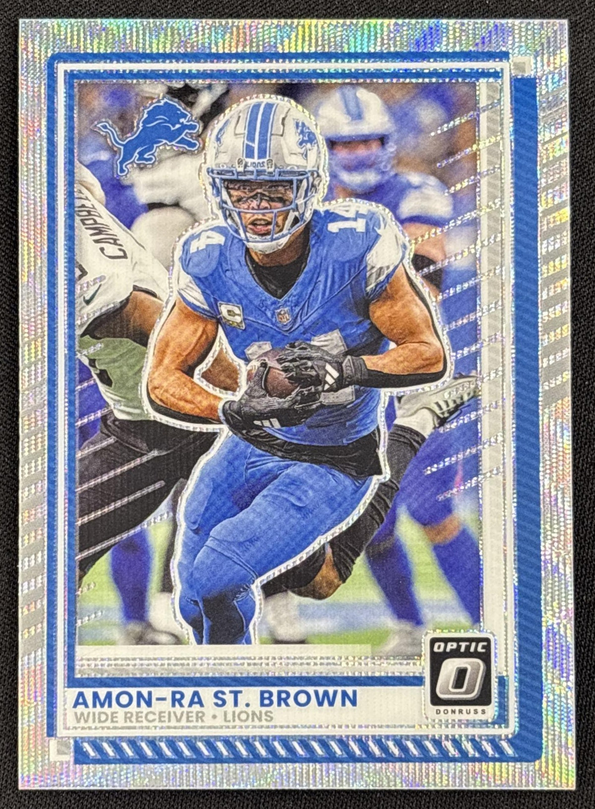 Amon-Ra St. Brown 2025 Panini Donruss Optic Wave Prizm /300 Lions