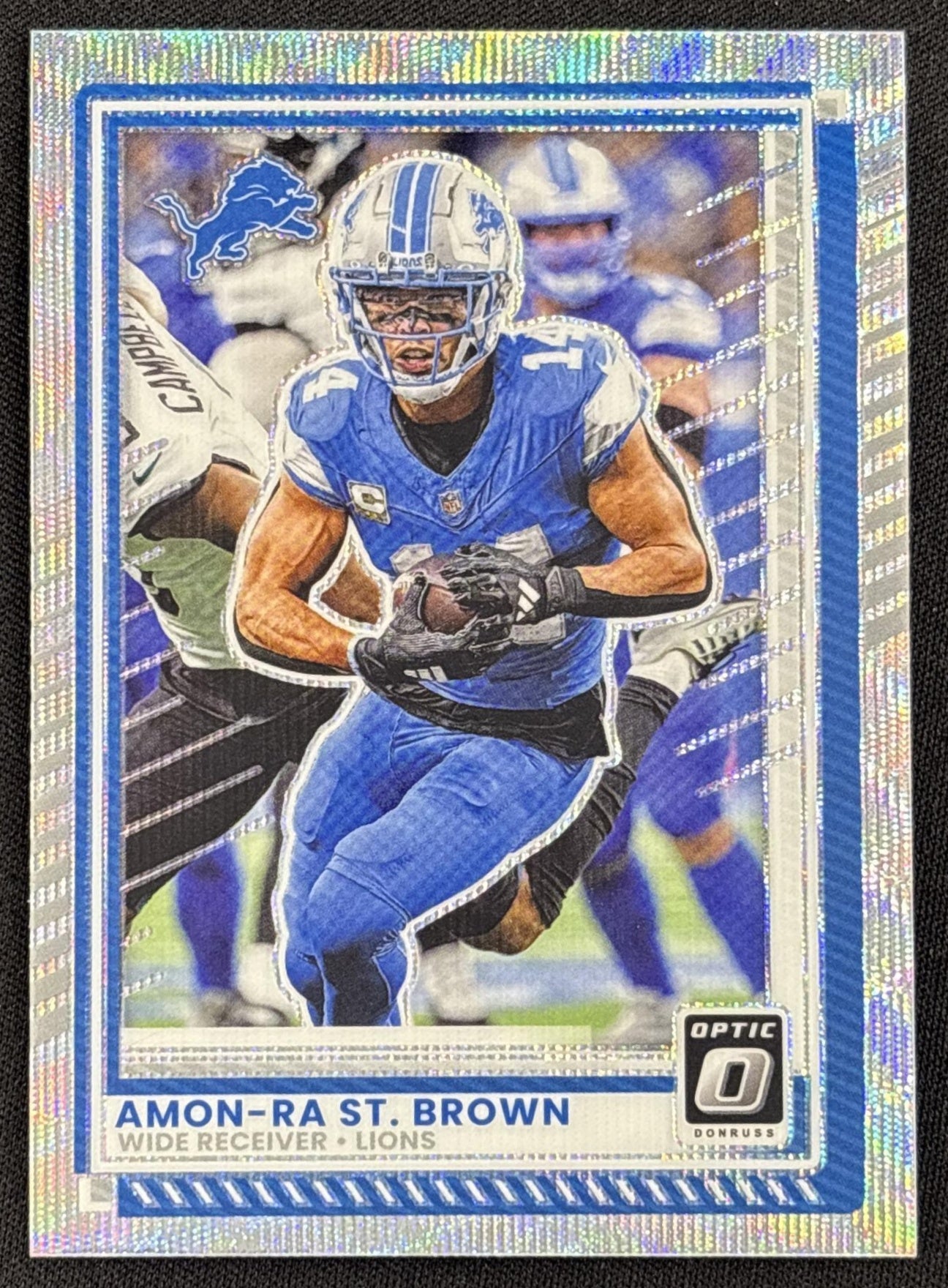 Amon-Ra St. Brown 2025 Panini Donruss Optic Wave Prizm /300 Lions