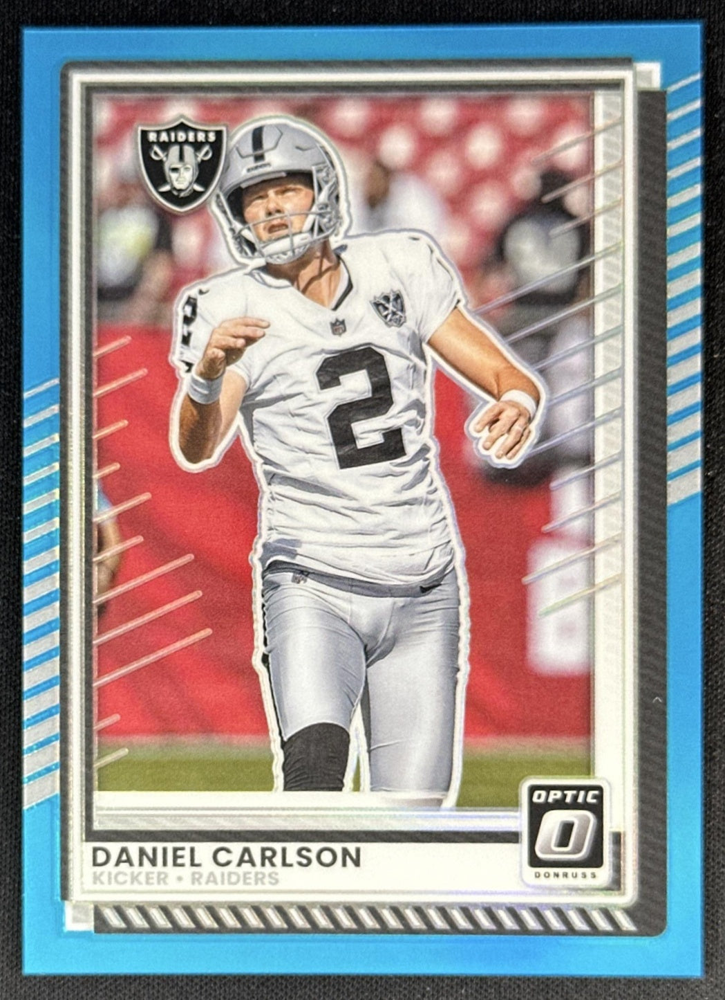 Daniel Carlson 2025 Panini Donruss Optic Neon Blue Prizm /399 Raiders Default Title Sports Trading Cards