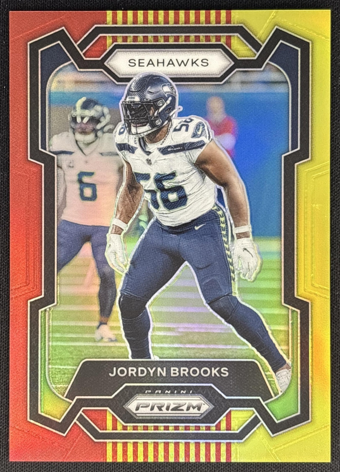 Jordyn Brooks 2023 Panini Prizm Red and Yellow /44 Seahawks Sports Trading Cards