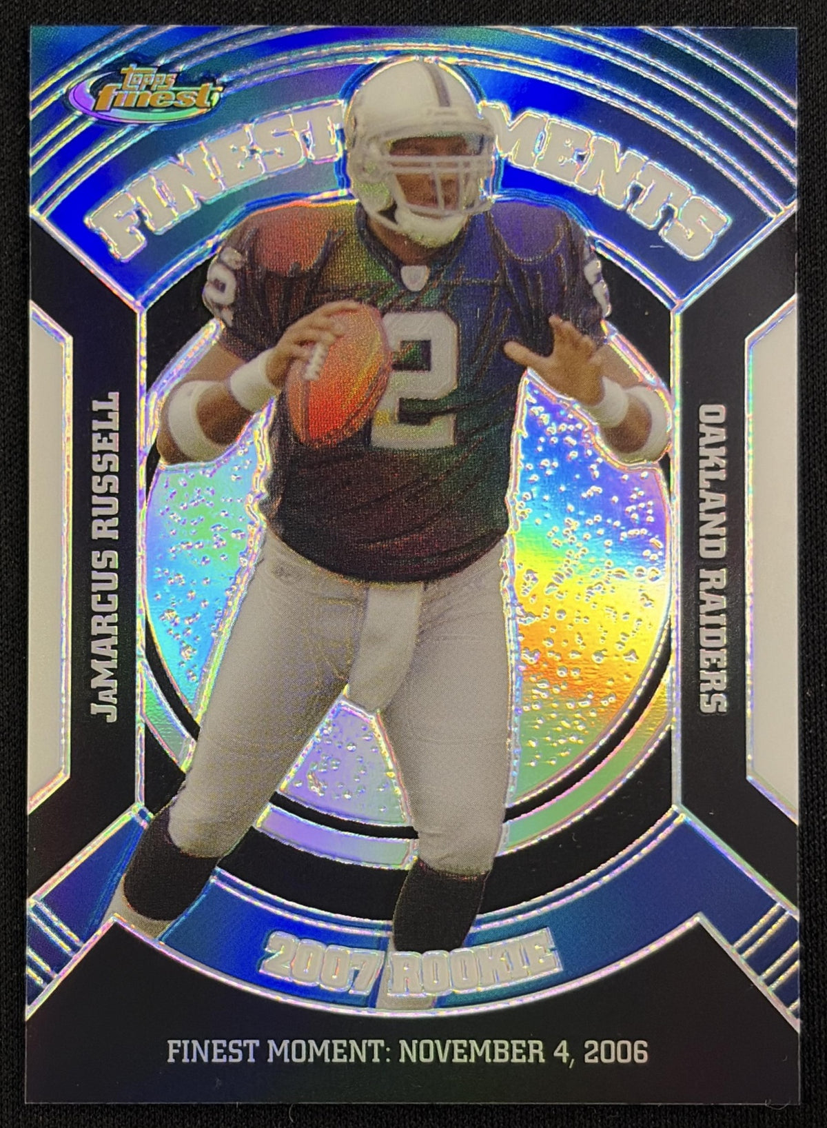 Front of JaMarcus Russell 2007 Topps Finest Moments Black Refractors /99 Raiders sports trading card
