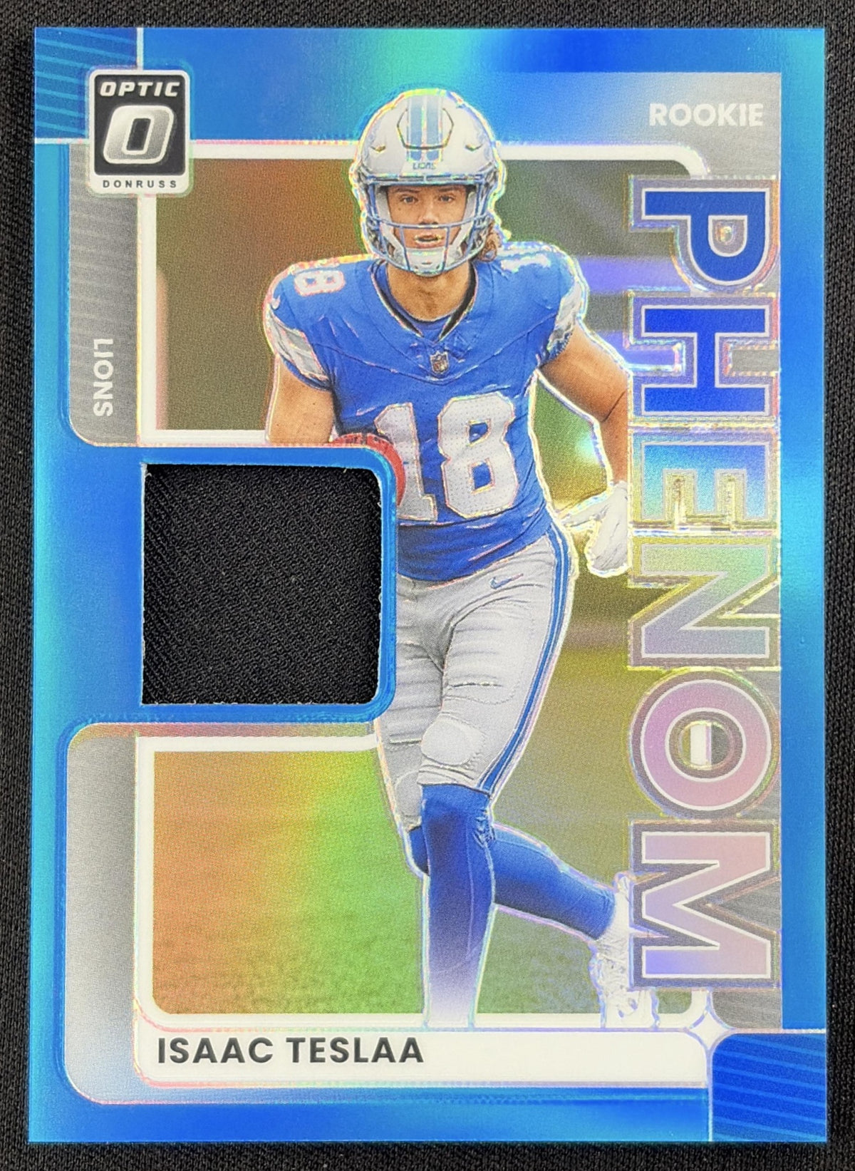 Isaac TeSlaa 2025 Panini Donruss Optic Rookie Phenoms Neon Blue Prizm Lions